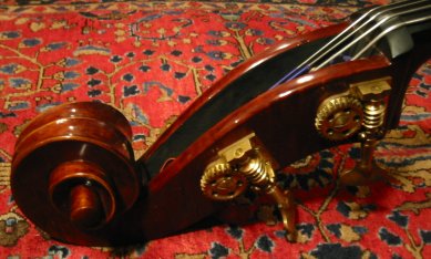 A double bass peg box and scroll